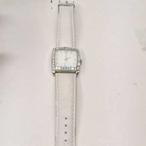 Base metal bezel watch white and silver cubic needs battery